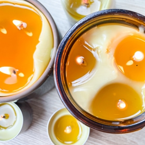 overhead view of burning beeswax candles