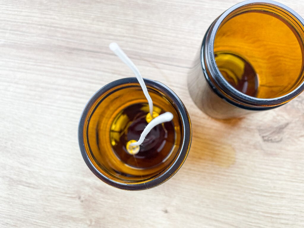 amber glass jars with 2 wicks