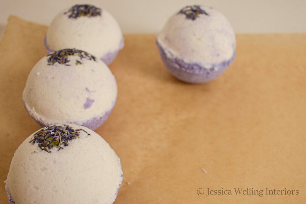 finished bubble bath bombs lined up to dry