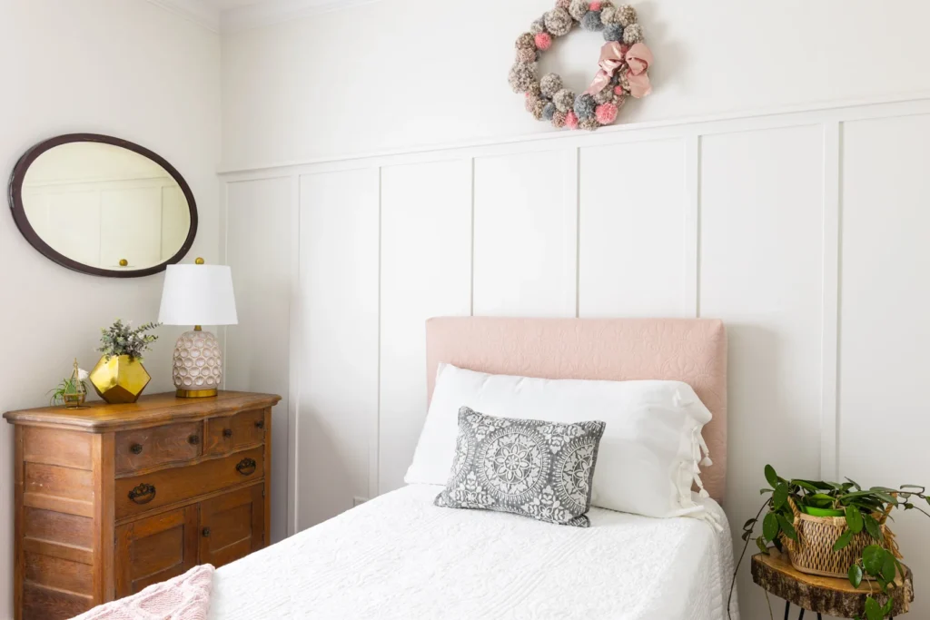 guest bedroom with a DIY board and batten accent wall