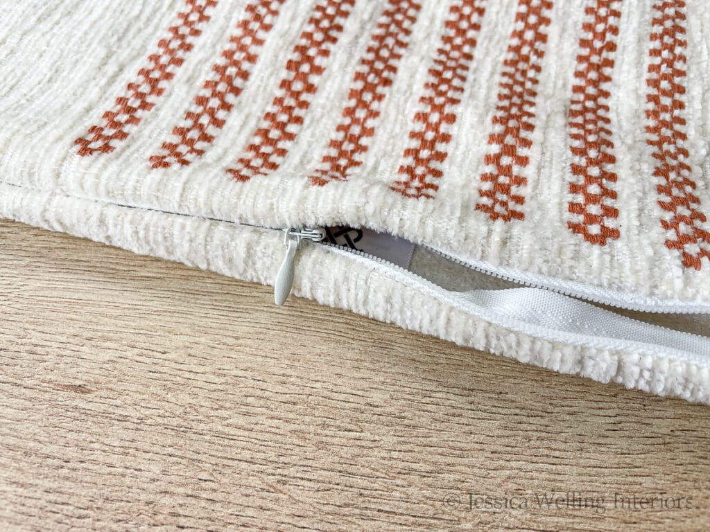 close up of a throw pillow cover's hidden zipper