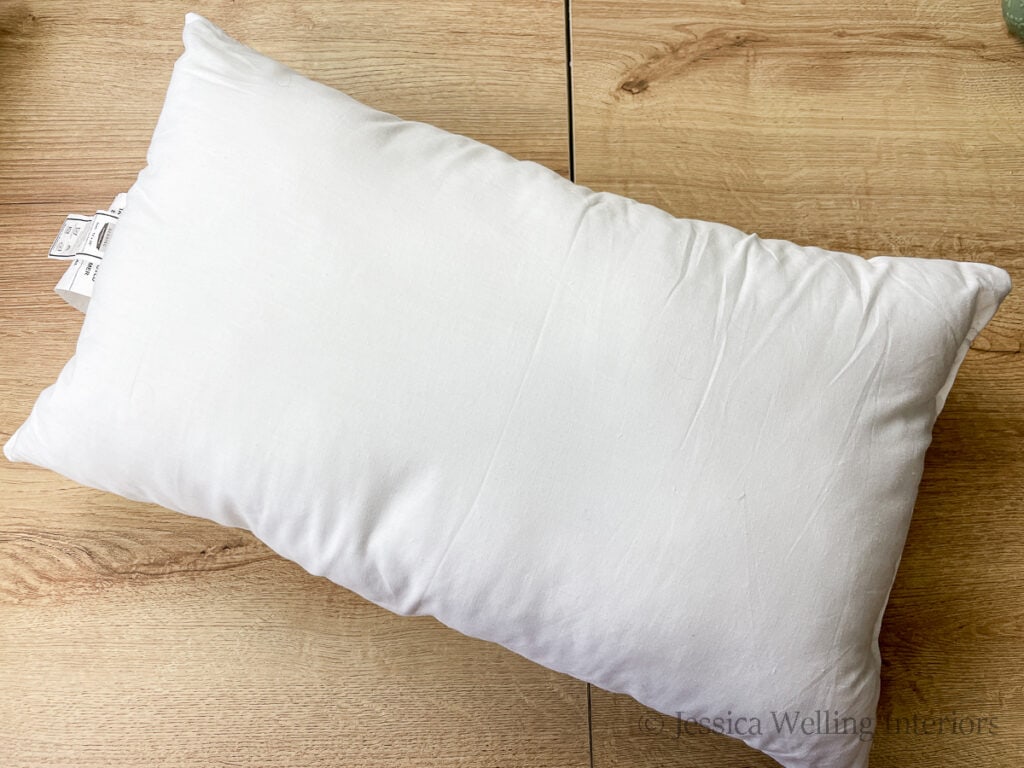 12x20 lumbar throw pillow insert on a table top