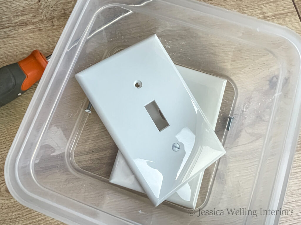 switch plate and outlet cover in a plastic container