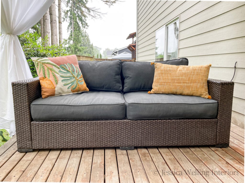 after photo of repaired wicker outdoor sofa with 