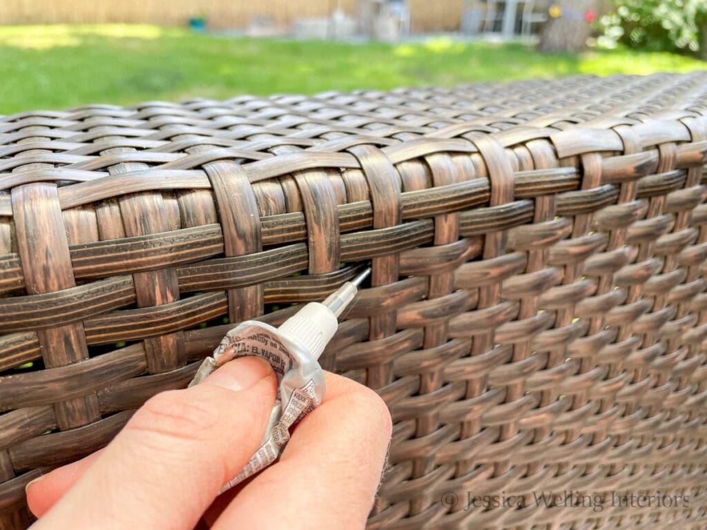 E6000 being applied to fix wicker outdoor furniture