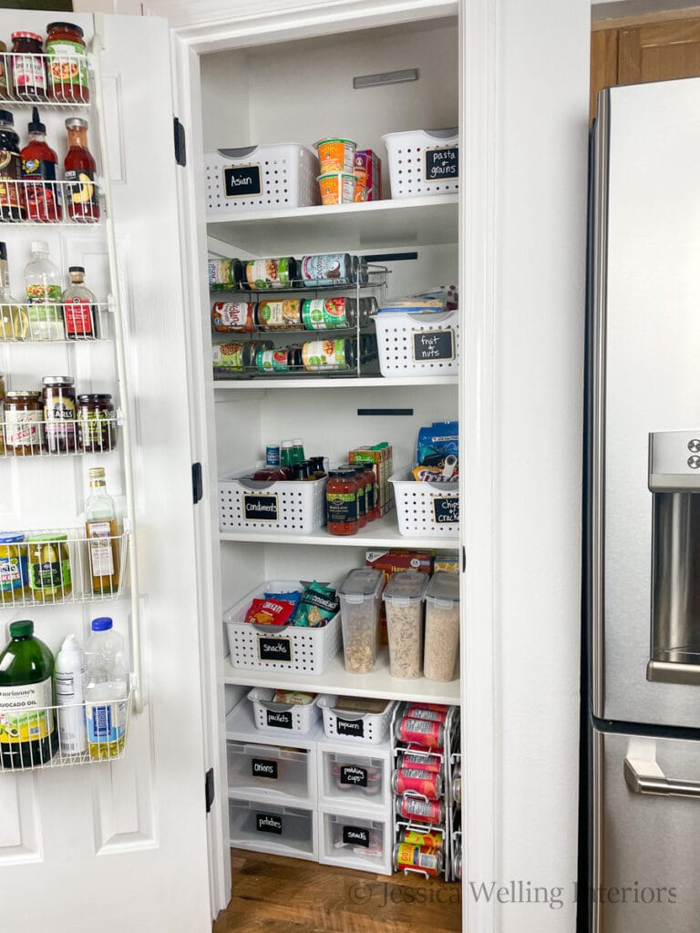 organized pantry with deep shelves and a back-of-the-door pantry organizer