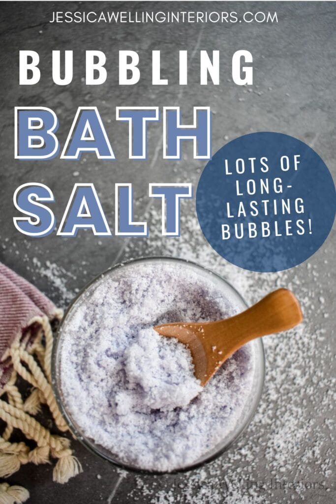 Bubbling Bath Salt: Lots of Long-Lasting Bubbles! overhead view of a glass jar of bubble bath salt with a wood scoop