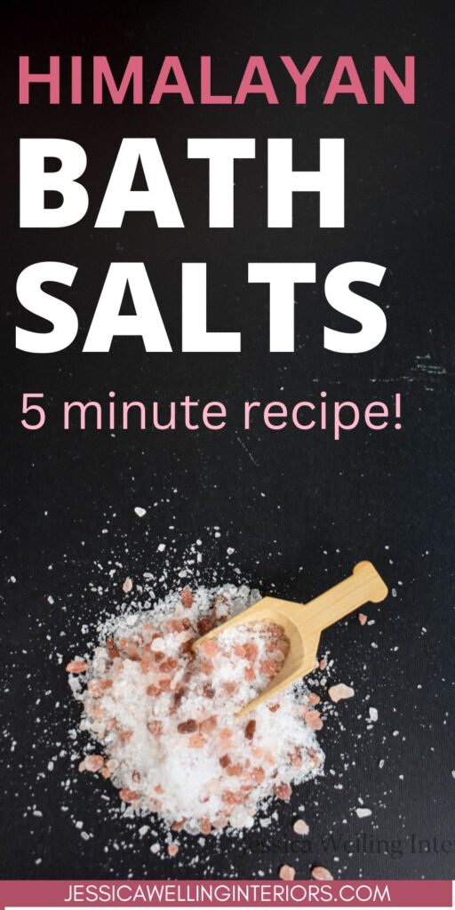 Himalayan Bath Salt; 5 minute recipe pink bath salt with a wood scoop on a black counter