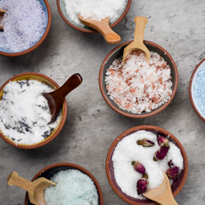 bowls of DIY bath salt on a countertop