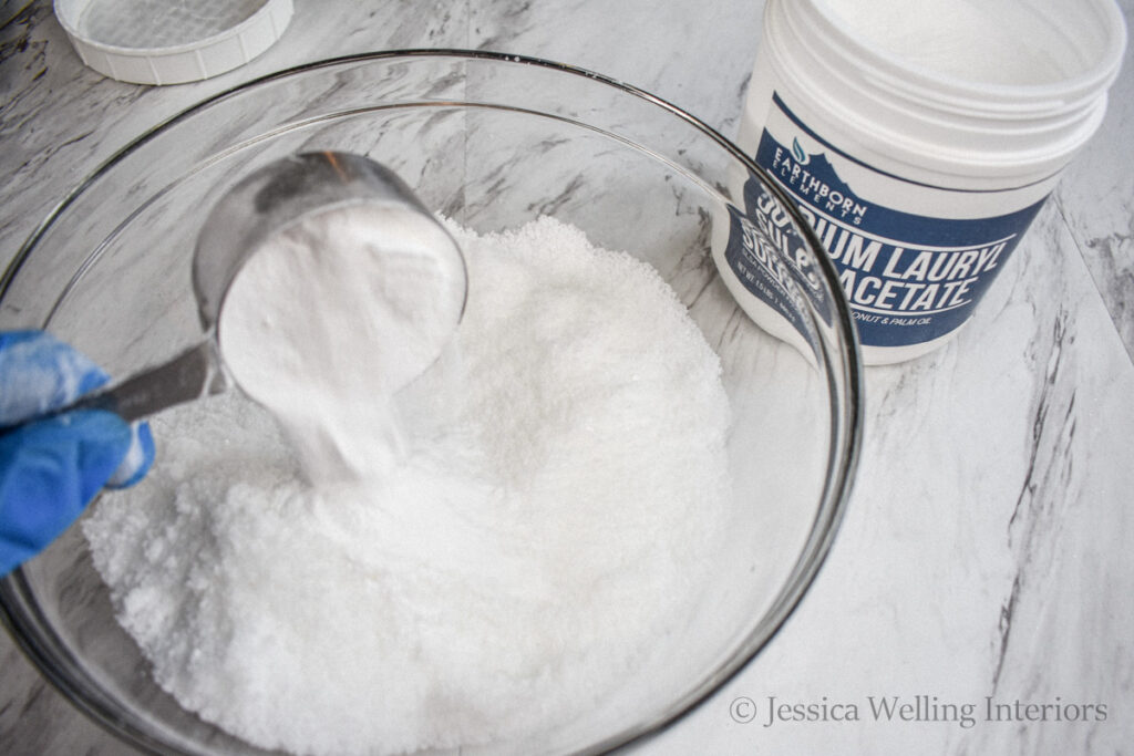 SLSA being added to a bowl of bath salt mixture