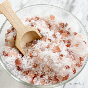 close up of a jar of pink Himalayan bath salt