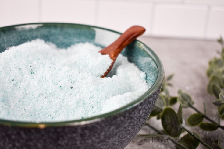 bowl of peppermint scented sinus relief bath salts with eucalyptus sprigs