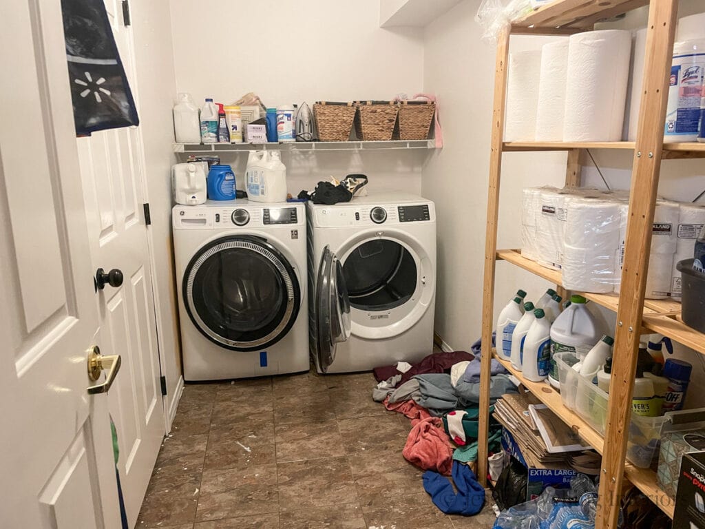 before photo of a messy laundry room