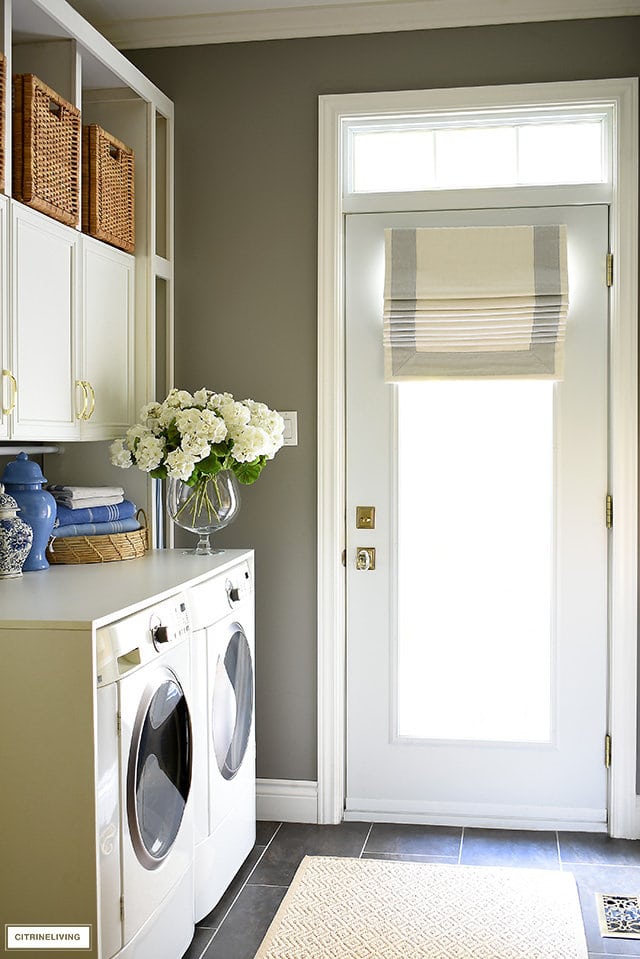 small laundry room/mudroom combo with a DIY counter over the washer and dryer